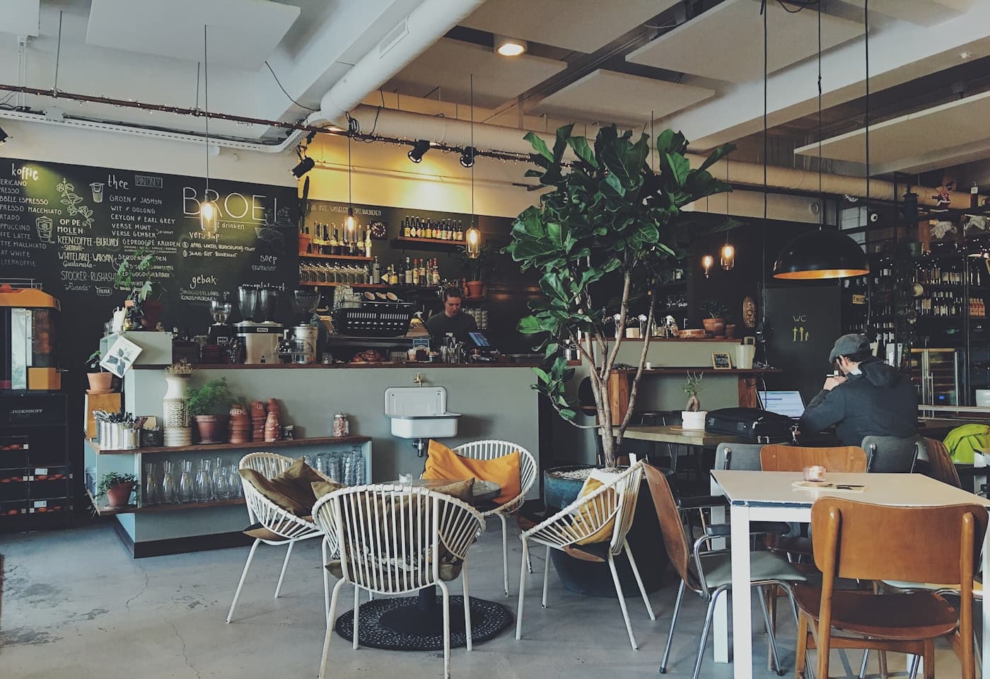 Aurora Café interior — limestone and morning light